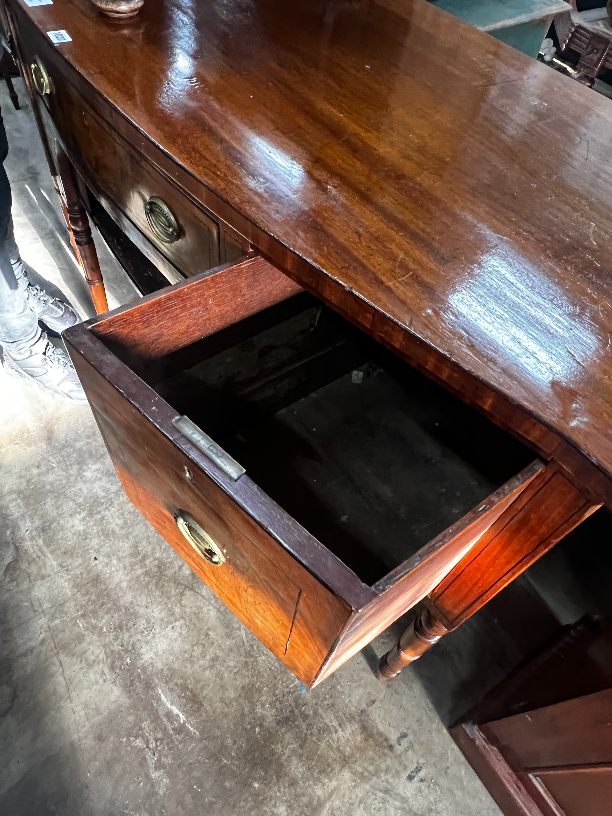 A Regency mahogany bowfronted sideboard, length 153cm, depth 58cm, height 92cm